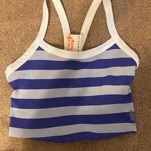 FP MOVEMENT Blue and White Striped racer back crop tank top.